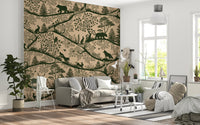 Light-filled living space featuring a grey sofa and beige forest wall mural.