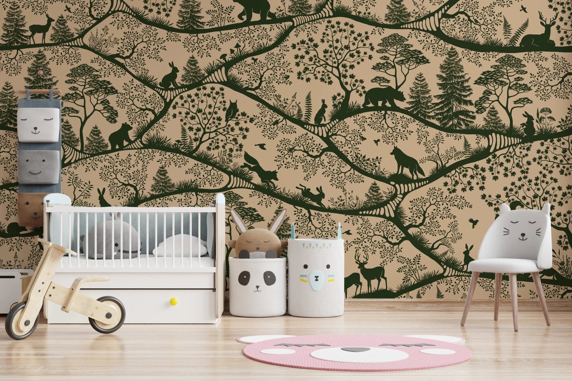 Kids play area with a white crib, wooden bike, and beige nature wall mural.