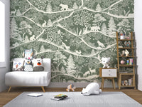 Illustrative nordic forest wall mural in a play area with a grey rug and wooden shelves.