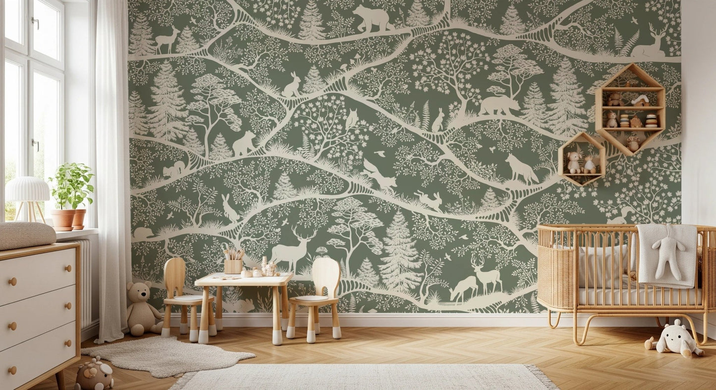 Green forest pattern wall mural in a neutral nursery with wooden furniture and toys.