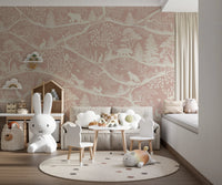 Pink Woodland wall mural behind a white sofa and round floor mat in a play area.