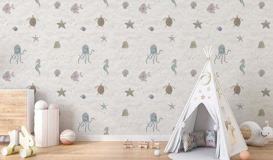Ocean inspired wallpaper with small fish and bubbles.