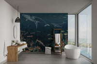 Vintage painting of whales and marine life wall mural in sunlit bathroom.
