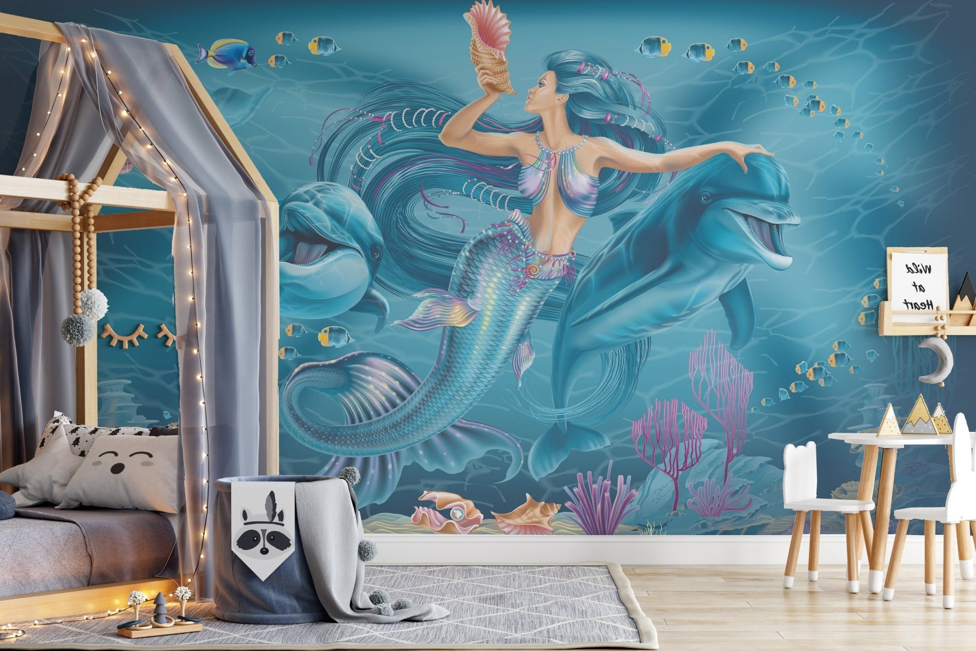 Oceanic mural featuring a mystical mermaid for tranquil toddler room walls.
