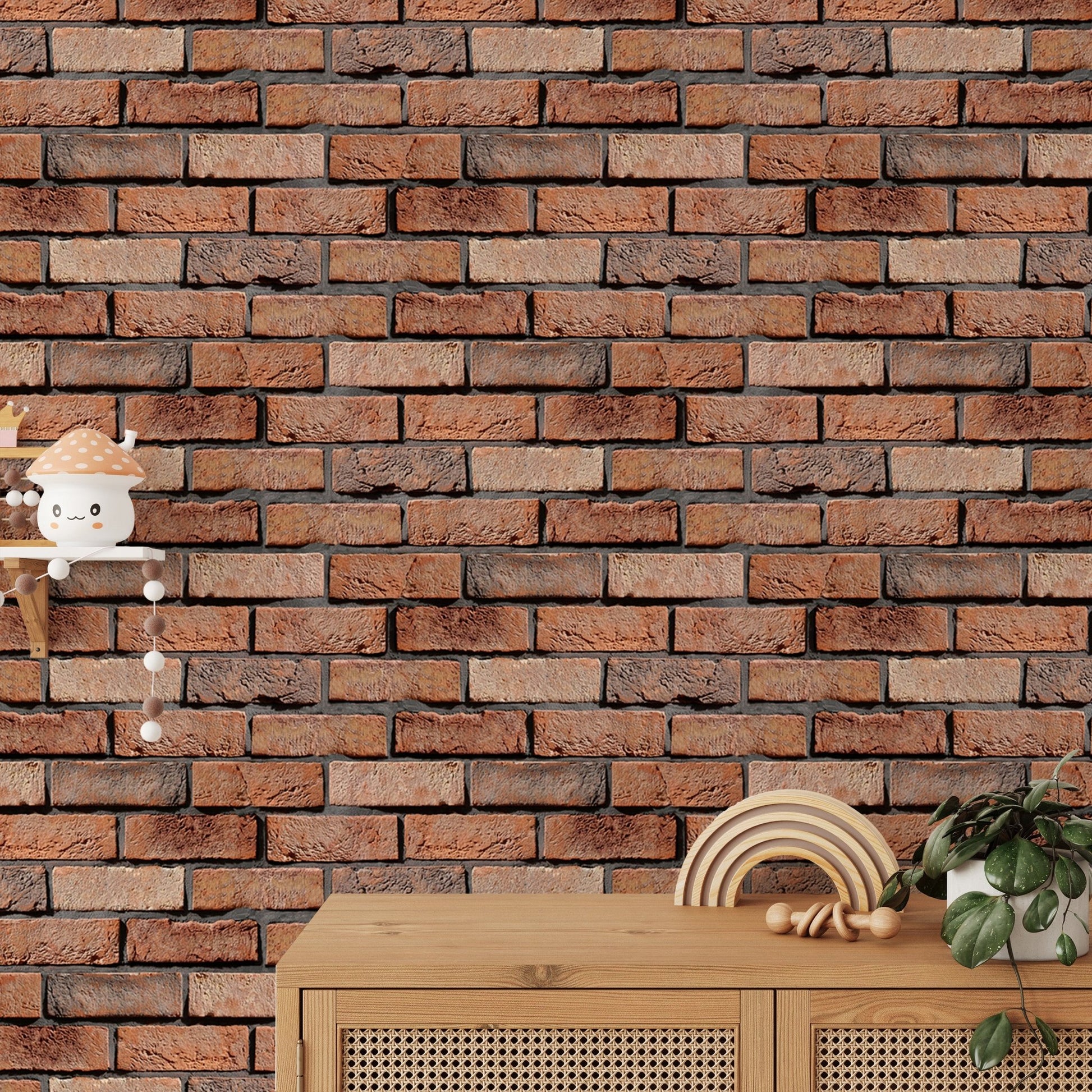 Rustic red brick wallpaper behind a light wood cabinet in a sunlit room