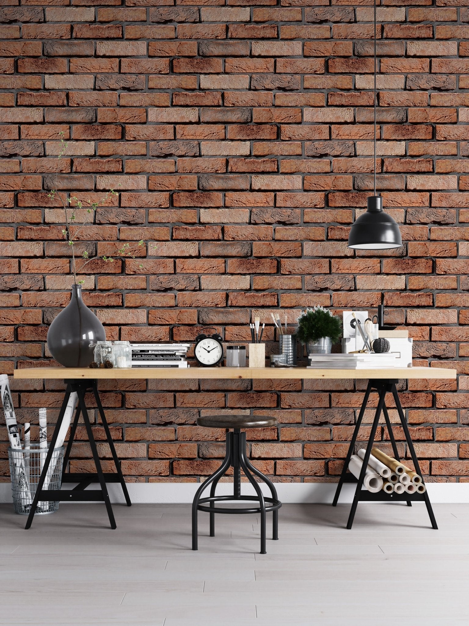 Industrial style red brick wallpaper in a home office with a black metal desk