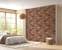 Brick pattern wallpaper on a bedroom feature wall with large windows