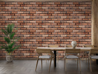 Old Red Brick Wall Rustic Texture Design Wallpaper in a dining room with wooden chairs