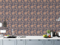 Vintage paisley wallpaper behind modern kitchen counter and white cabinets.