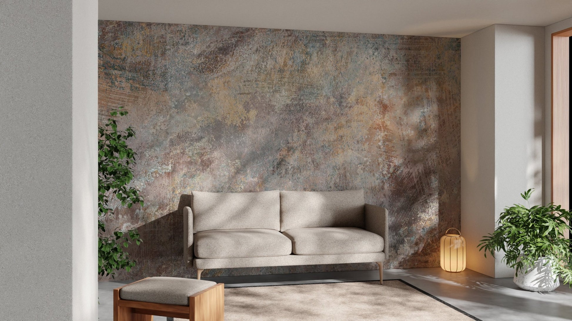 Weathered stone effect wall mural behind a grey couch in a minimalist living space.