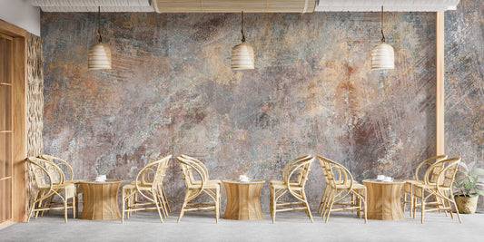 Old Rustic Concrete Stone Wall Mural in a cafe with wooden chairs and warm lighting.