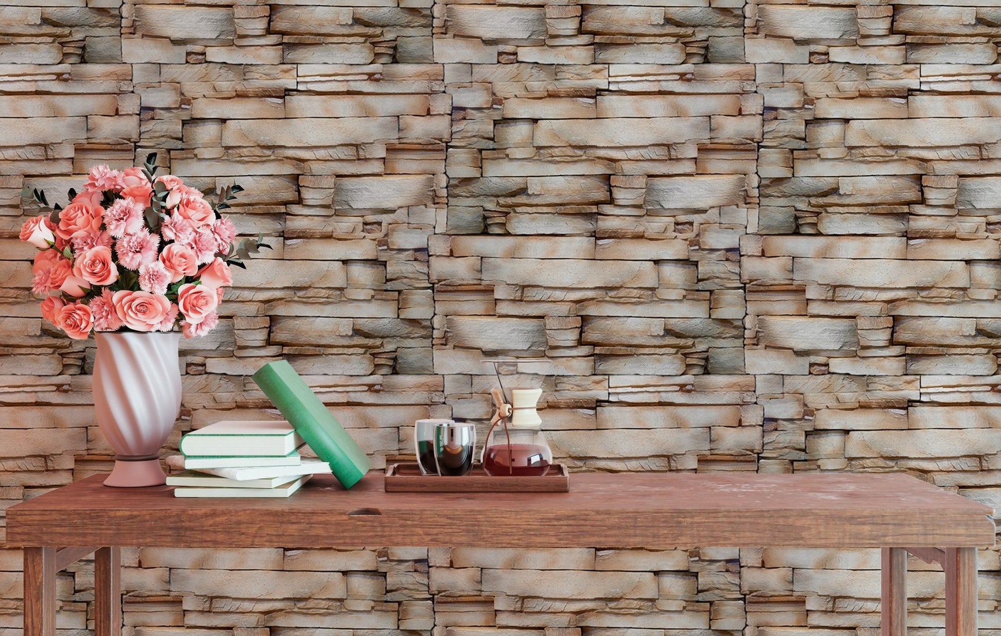 Earth tone stone wallpaper behind a console table with pink flowers.