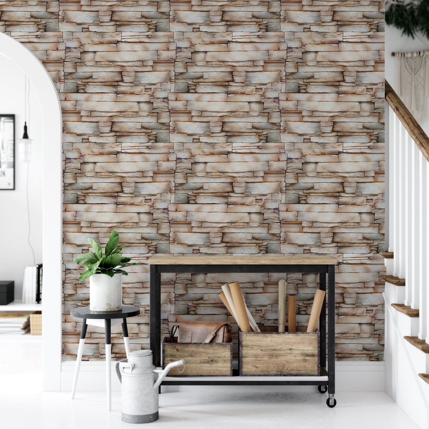 Neutral stone wallpaper in a hallway with a black metal console table.