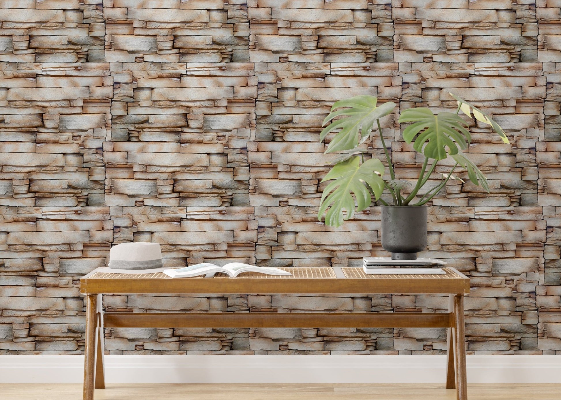 Horizontal stone block wallpaper in a minimalist room with a low bench.