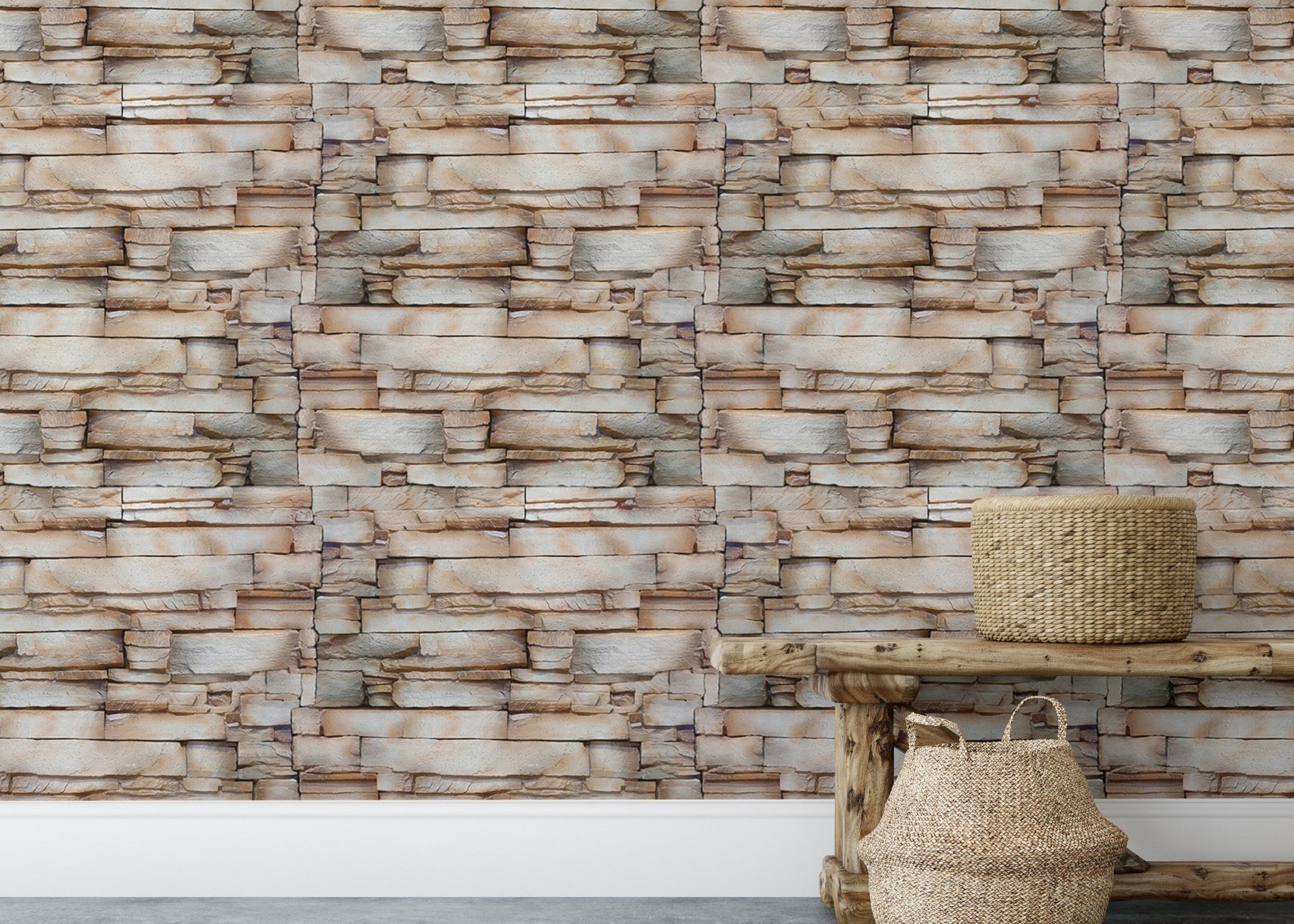 Rustic stone wallpaper behind a wooden bench and woven baskets.