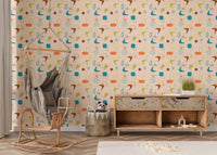 Nursery wall mural with a wooden rocking chair and atomic era geometric shapes.