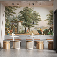 Cafe seating area with historical village wall mural and wooden stools