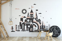 Once Upon a Time mural featuring a magical castle and kingdom in kids creative room.
