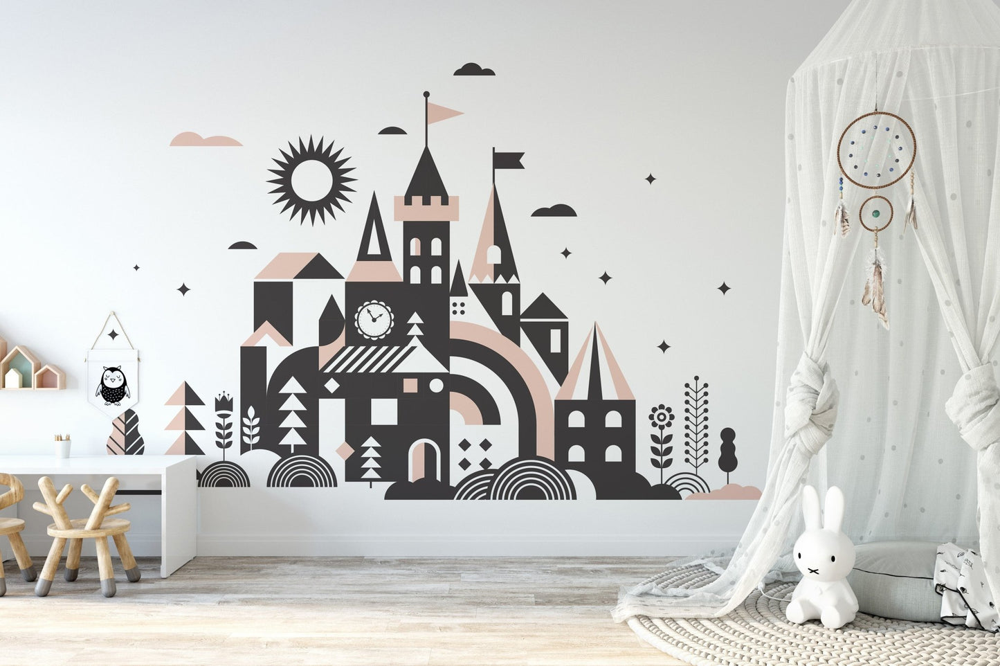 Fantasy fairy tale mural with a picturesque kingdom setting in nursery.
