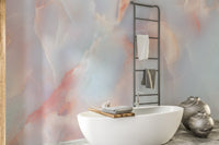 Marble effect wall mural in a bright bathroom featuring a wooden ladder rack.