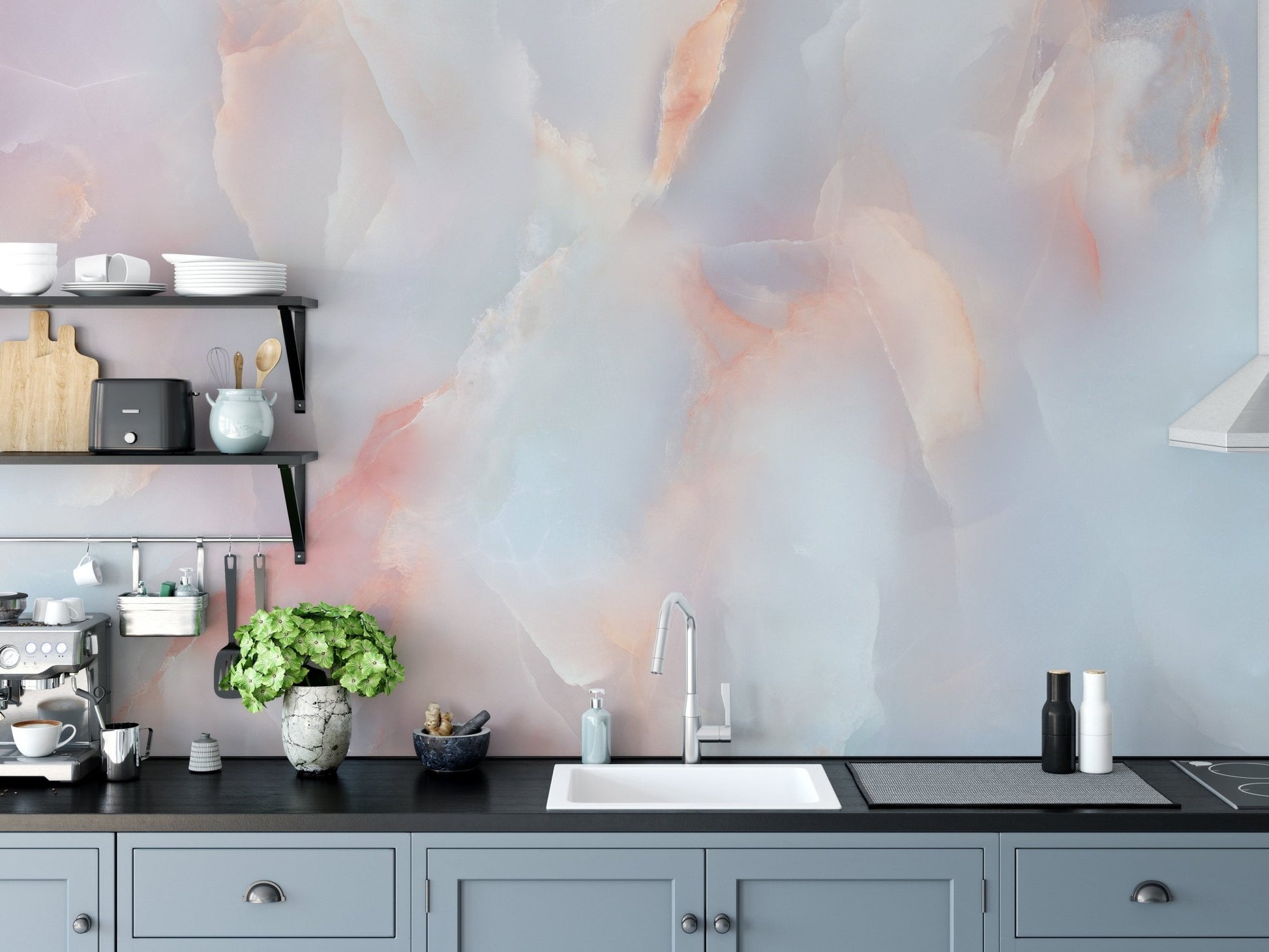 Pink and grey stone pattern wall mural in a kitchen with dark grey cabinets.