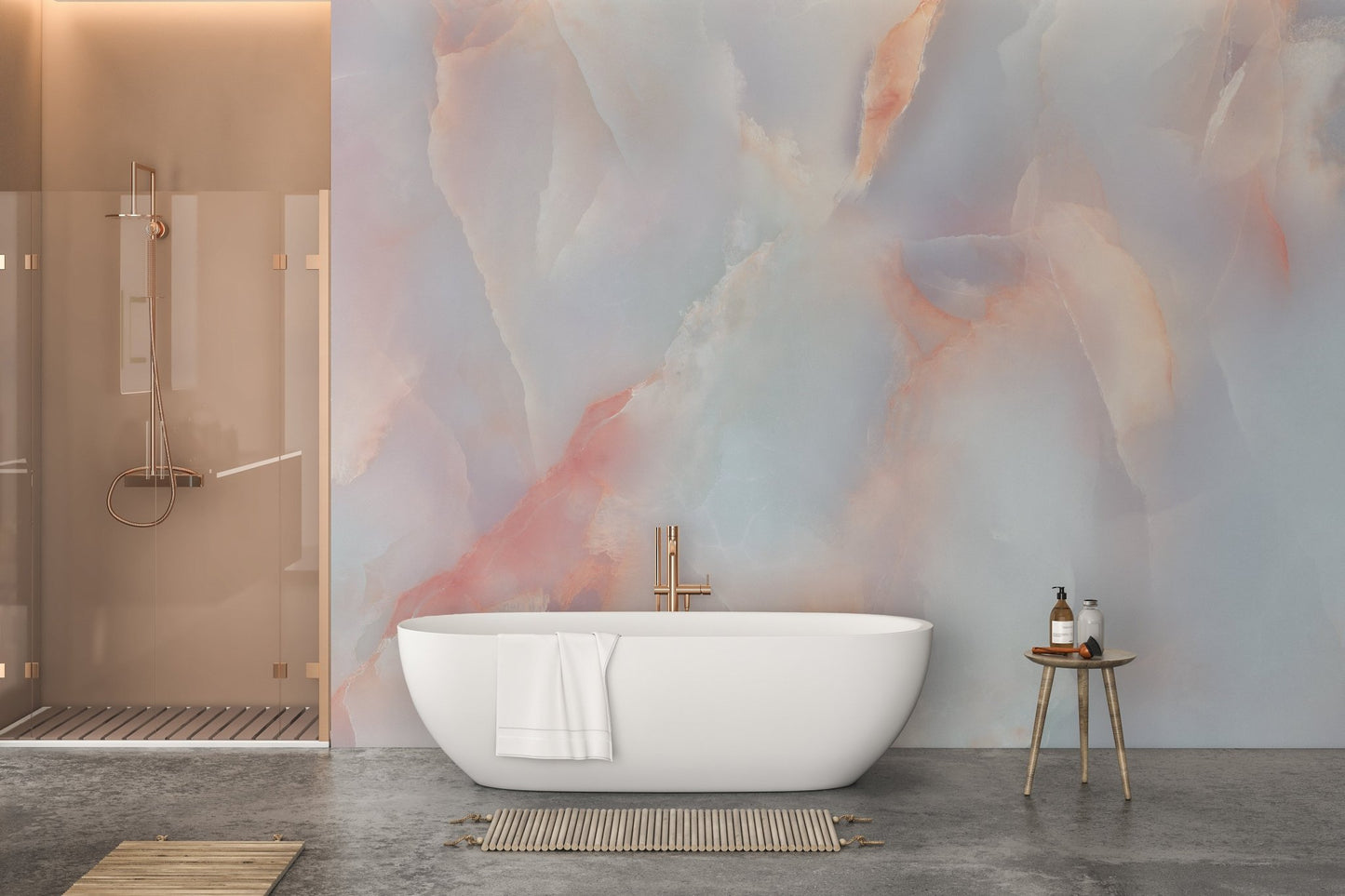 Pink onyx stone wall mural behind a freestanding tub in a minimalist bathroom.