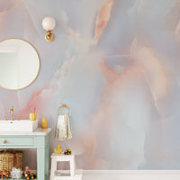 Onyx Pink Crystal Marble Wall mural in a modern bathroom with a green vanity.
