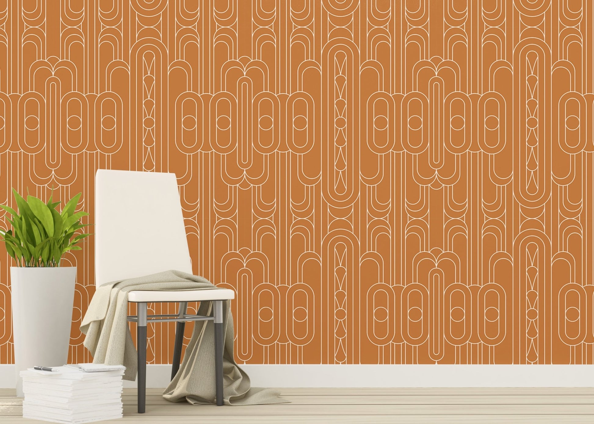 Minimalist geometric wallpaper behind a wooden chair with green plants.