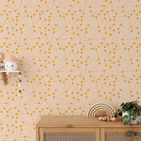 Geometric line art mural on a feature wall with indoor plants.