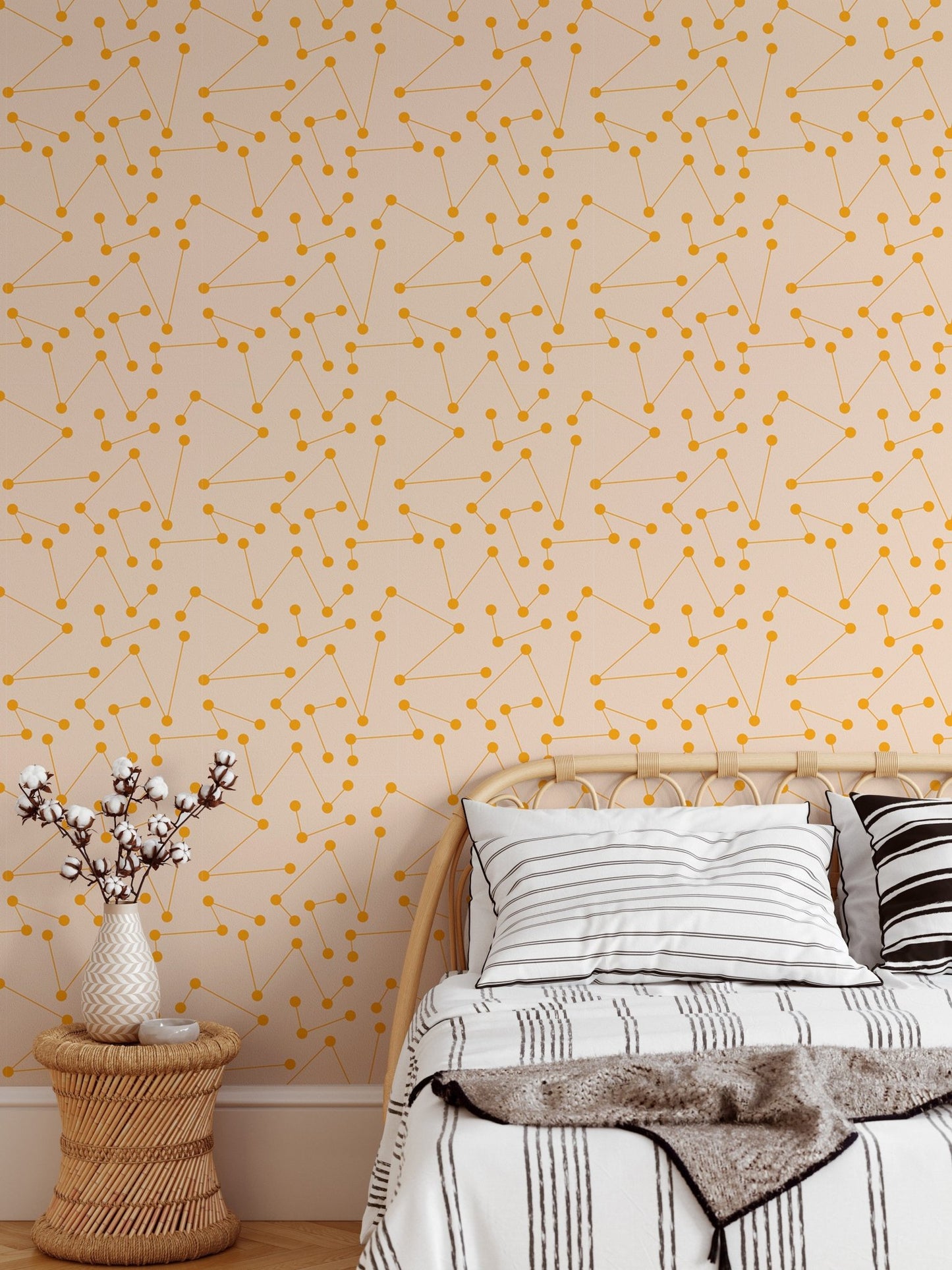 Modern star pattern wall mural behind a light wood bed frame.