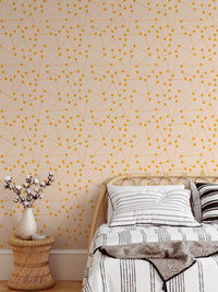 Modern star pattern wall mural behind a light wood bed frame.