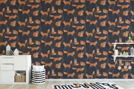 Orange Foxes Fun Removable Wallpaper in a nursery with a white dresser.