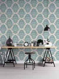 Ornamental damask delight repeat pattern wallpaper behind an office desk.