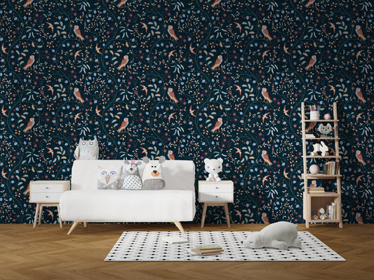 Owl and leaves wallpaper behind a bright sofa in a cozy modern living room.