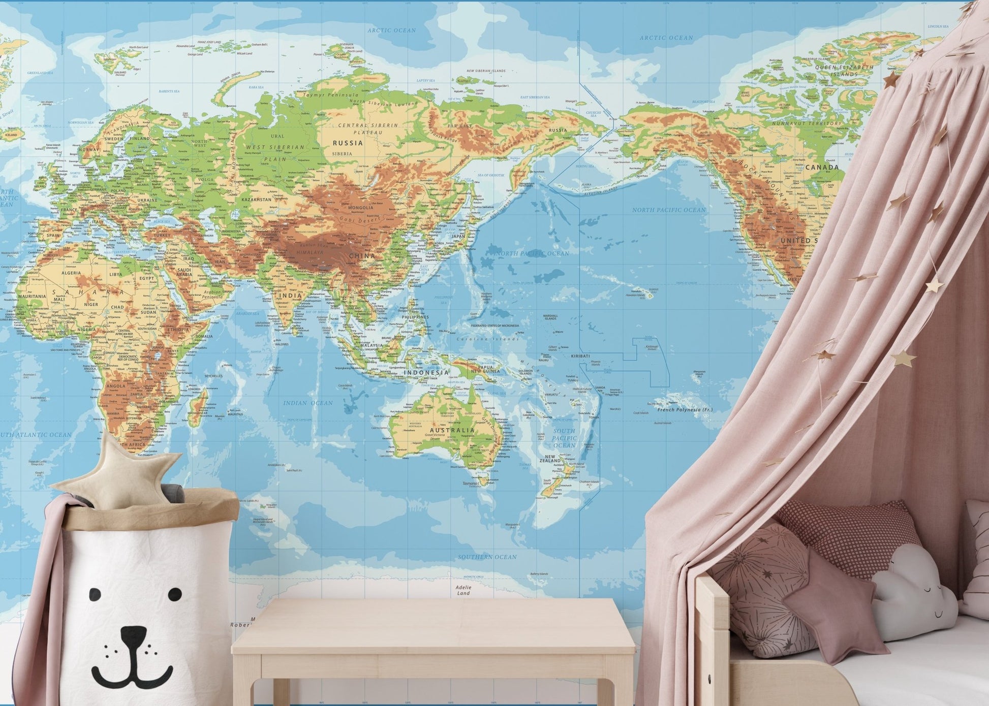 Modern bedroom with Pacific View World Map wall mural behind bed