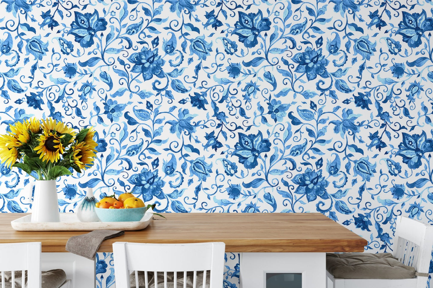 Kitchen dining area wallpaper featuring blue flowers and wooden table.