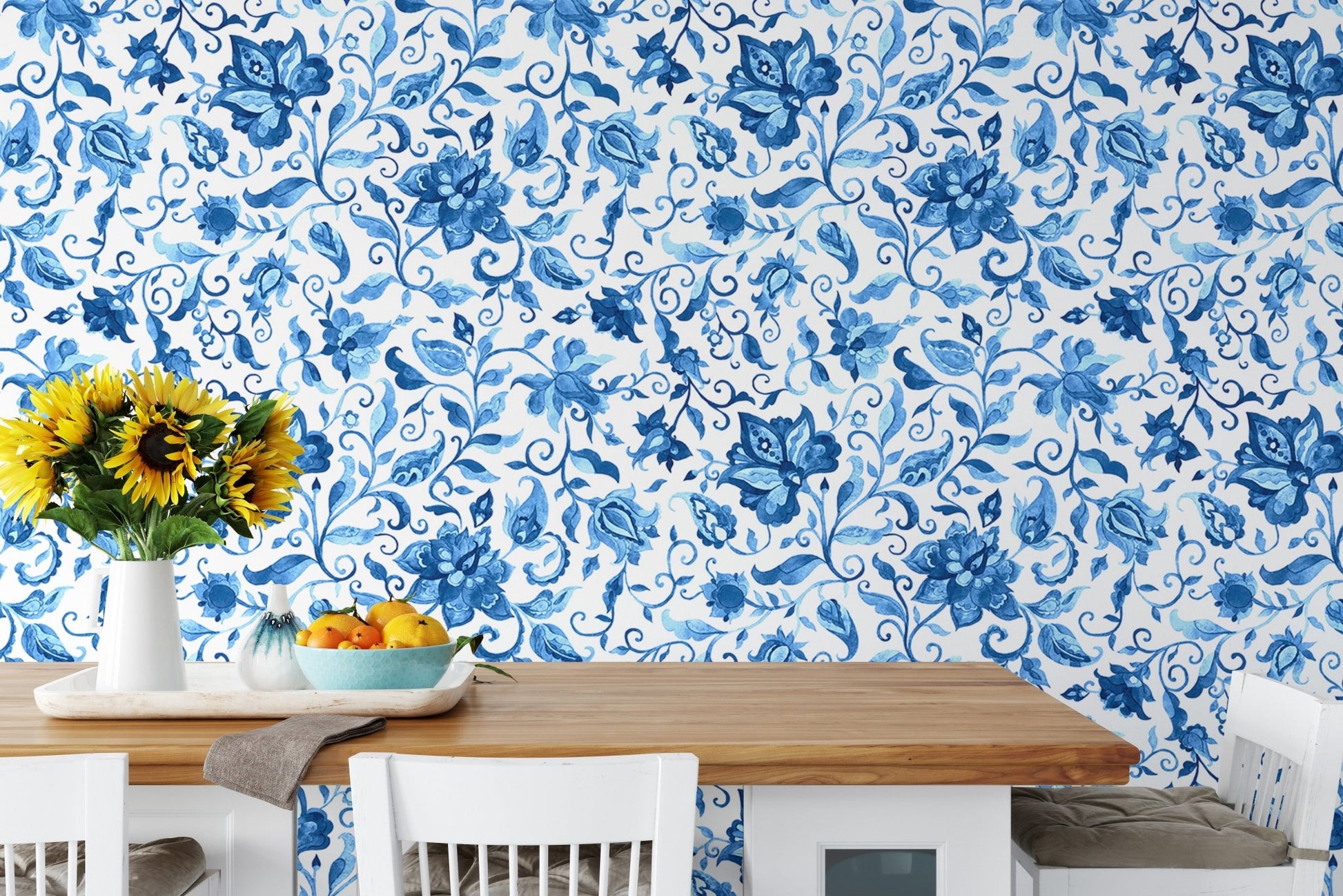 Kitchen dining area wallpaper featuring blue flowers and wooden table.