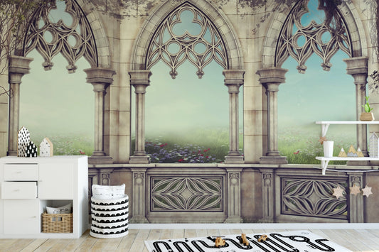 Gothic stone arch serenity wall mural in a modern playroom with white cabinets.