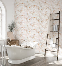 Bathroom wall covered in stylish palm branches tropical leaves wallpaper.