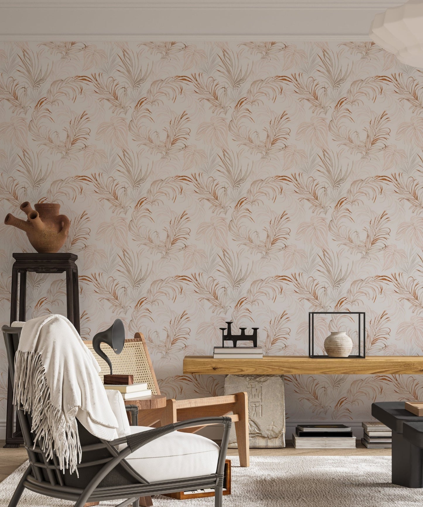 Minimalist living space featuring tropical leaf wallpaper design.