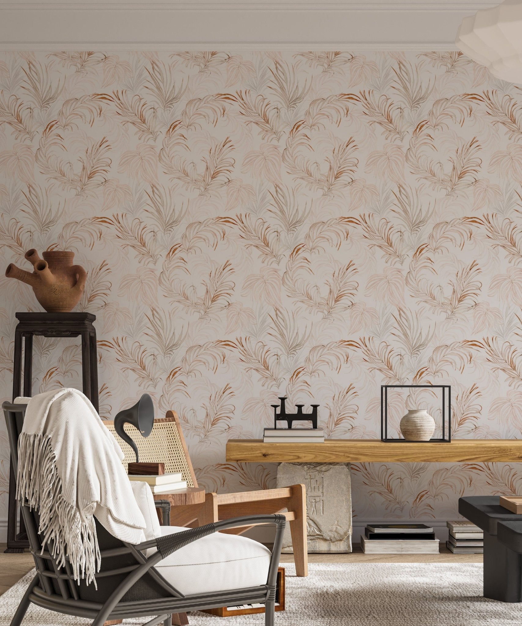 Minimalist living space featuring tropical leaf wallpaper design.
