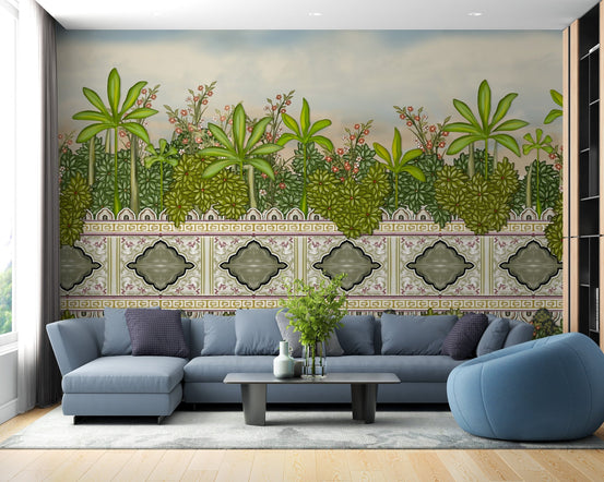 Blue sectional sofa paired with a tropical green palm and grey patterned wall mural.