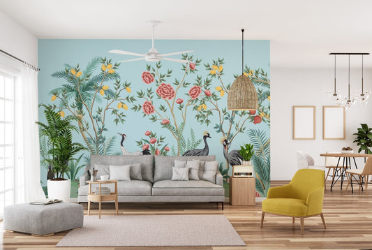 Living room with blue Chinoiserie wall mural and yellow armchair.