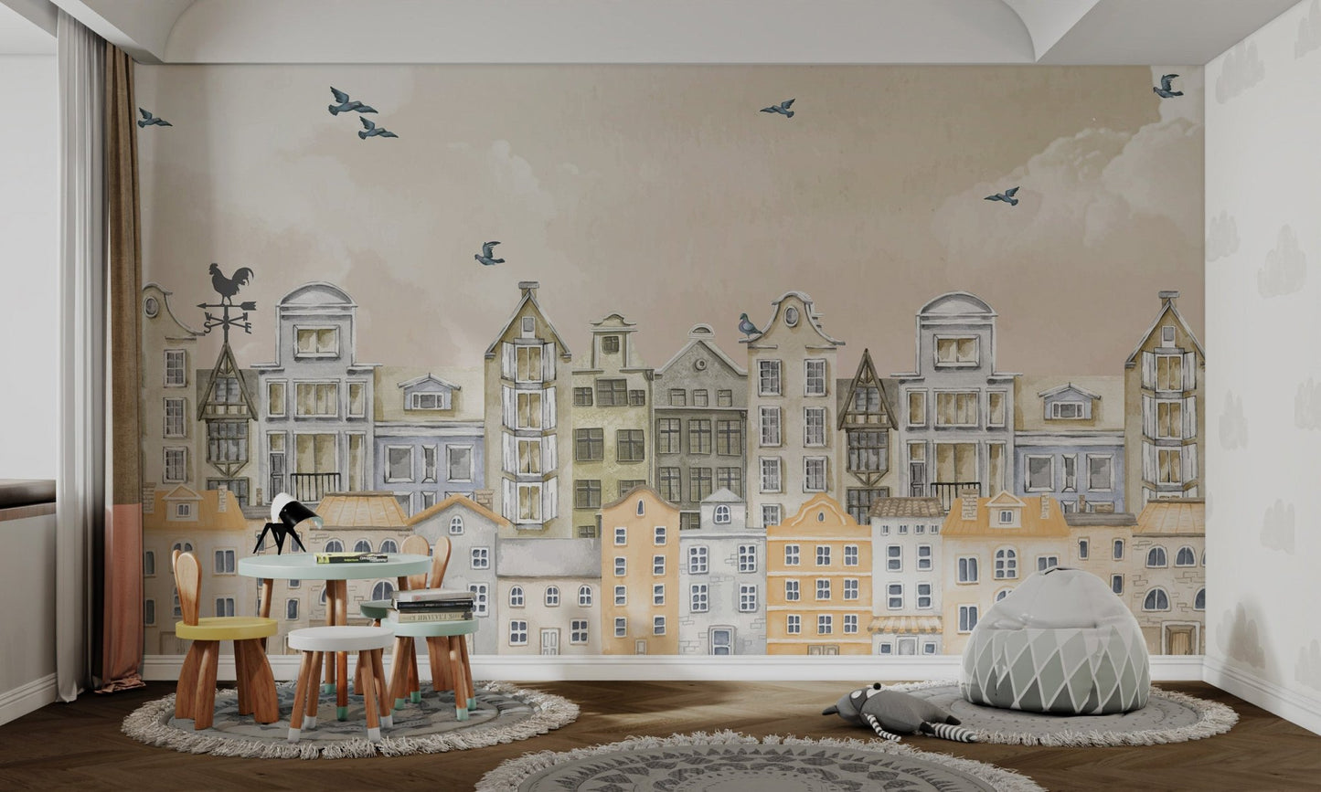 Watercolor mural of charming European houses with flying birds in study room.