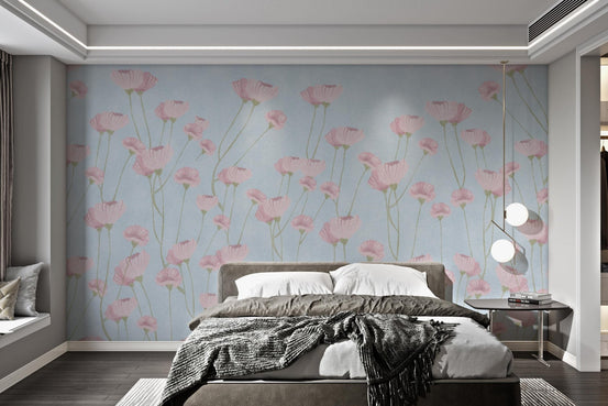 Modern botanical wall mural with pink watercolor petals and blue backdrop.