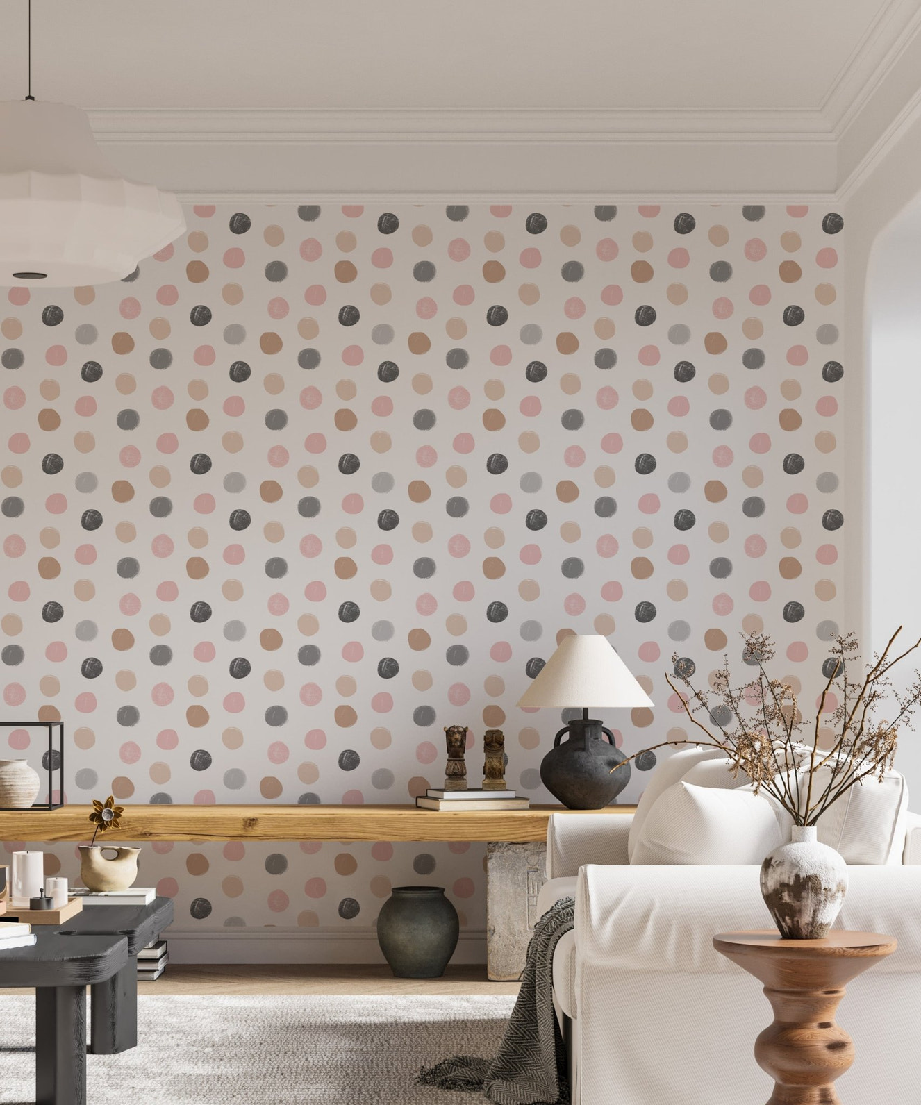 Hand drawn grey and pink dots wallpaper behind a wooden table