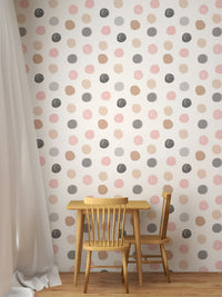 Pastel Colorful Pattern Polka Dots Kids Wallpaper behind a wooden desk and chair in dining area.