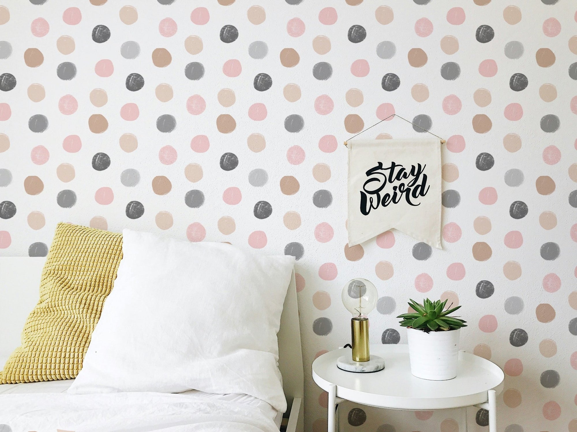 Pastel Colorful Pattern Polka Dots Kids Wallpaper in a bedroom with white bedding