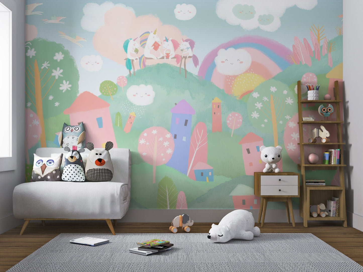 Pink and blue unicorn village mural for playful nursery wall
