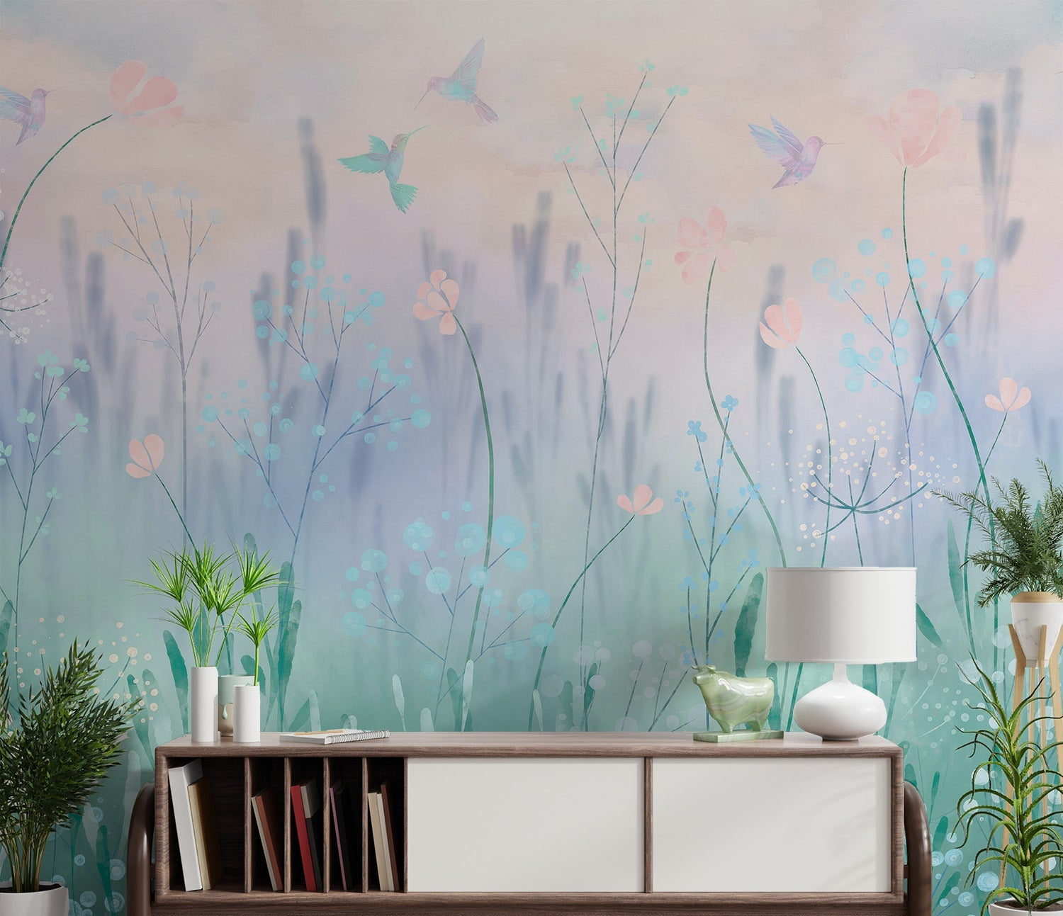 Hummingbirds hovering over pastel pink and blue wildflowers.